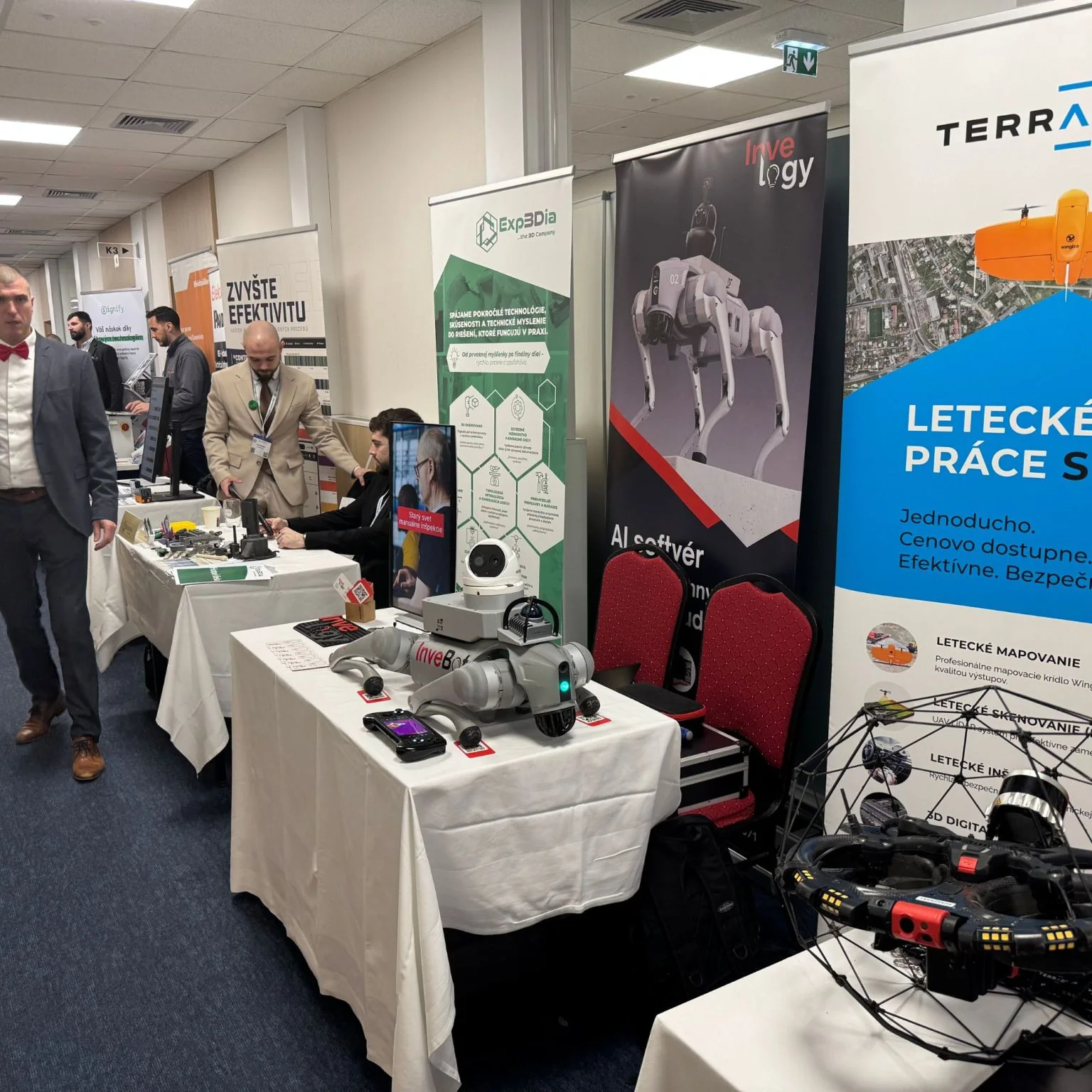 Invelogy's stand featuring a quadruped robot at the industrial maintenance conference